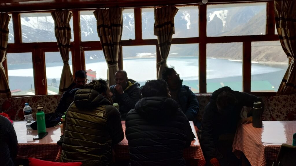 Trekkers gathering together in dining hall of a teahouse in Nepal